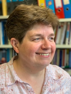 This image is a portait shot of Theresa smiling into the camera