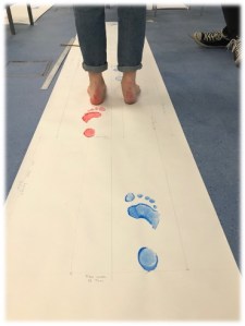 Walking and leaving foot prints in paint. 