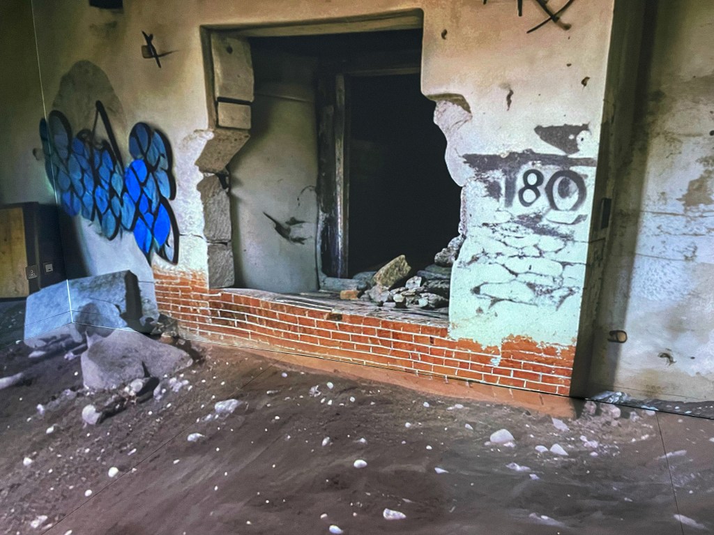 Inside immersive room of a derelict building